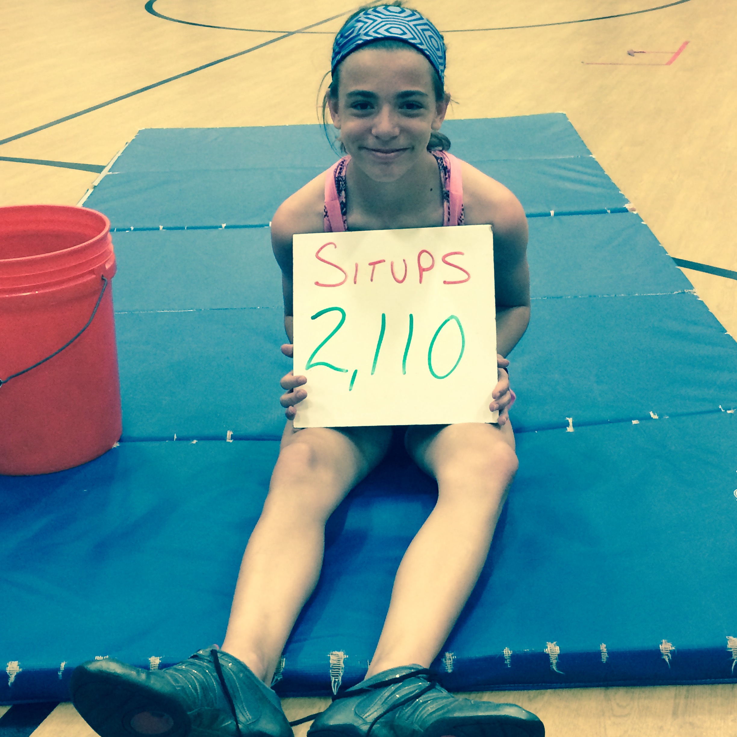 PHOTO:Kyleigh Bass, 10, broke the Project Fit America record national record for the most sit-ups with 2,110 on May 7 in the gymnasium at Fox Hill Elementary School in Kansas City, Missouri. 