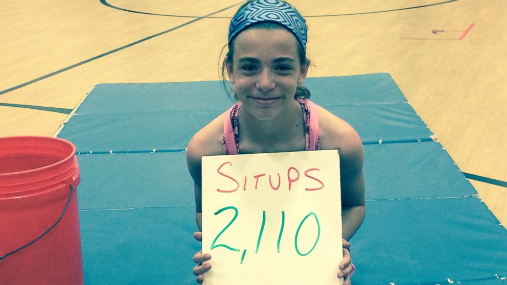 PHOTO:Kyleigh Bass, 10, broke the Project Fit America record national record for the most sit-ups with 2,110 on May 7 in the gymnasium at Fox Hill Elementary School in Kansas City, Missouri. 