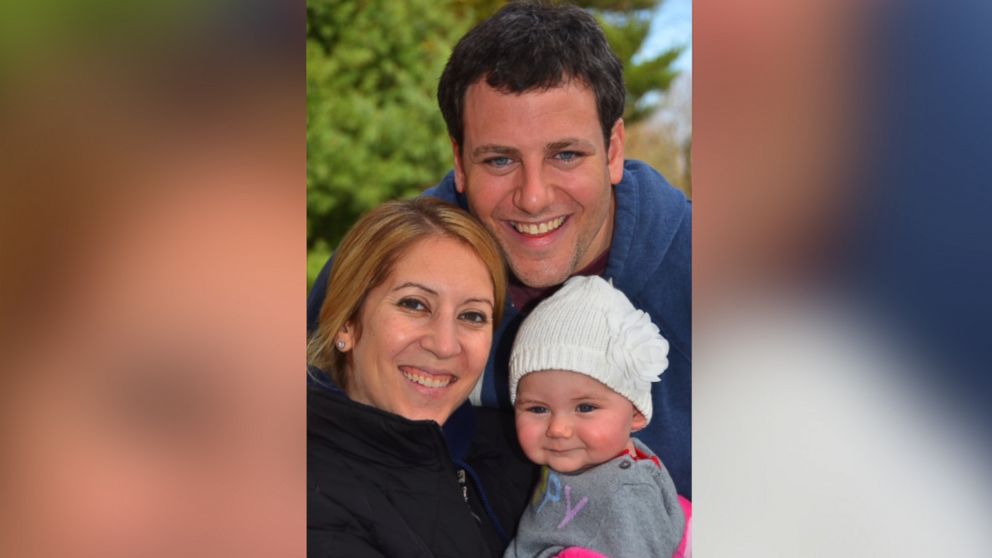 Stacey Wanicur, pictured with her husband and one-year-old daughter, called her moms' Facebook group "the number-one influential resource for me" since becoming a new mom. 