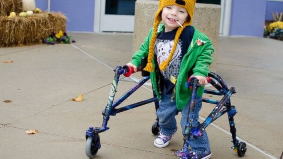 Henri "Kai" Grabill, 2, had his new walker painted by tattoo artist Nathan Gerger of Ankeny, Iowa two weeks ago.