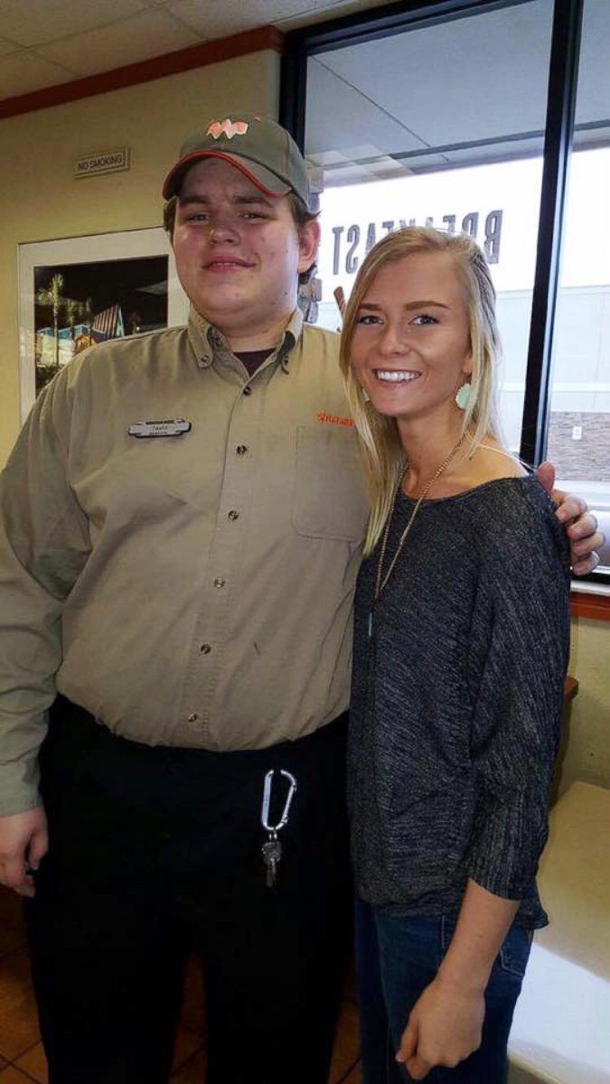 PHOTO: Taylor pictured with Kolbie Sanders, 21, who shared the photo on Facebook of customers kindly writing down their food orders, after learning he was deaf. 