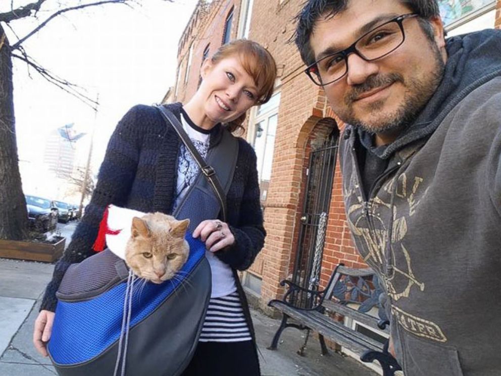 PHOTO: Tigger photographed with his owners Adriene Buisch and Michael Trentadue.adventure.