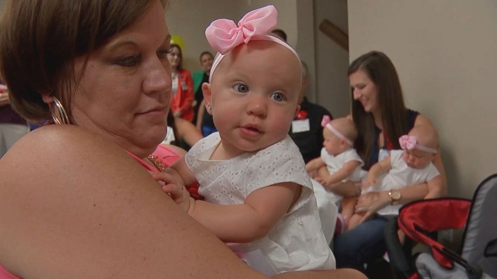 PHOTO: On August 5, identical triplets Kinsley, Savannah and Addison Harris, now 8 months old, visited the hospital workers who helped care for them in the NICU at at Memorial Hermann Southeast Medical Center in Houston.