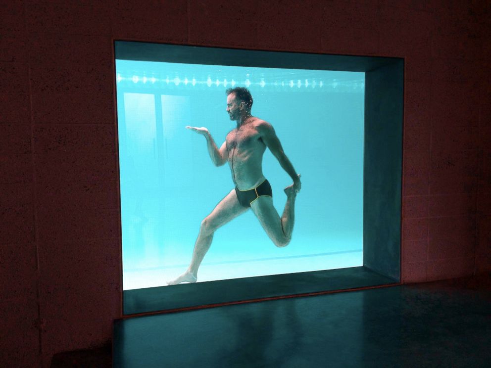 PHOTO: Fitness expert Scott Cole performs underwater yoga poses, 2014.