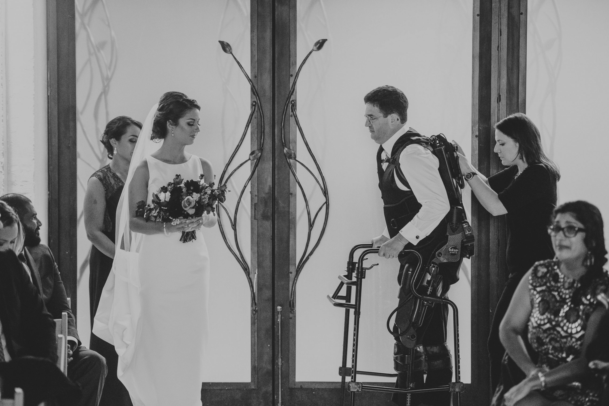 PHOTO: Scott Holland didn't let his multiple sclerosis stop him from walking his daughter, Elise Holland, down the aisle. He surprised her on her wedding day by using an exoskeleton to help him walk. 