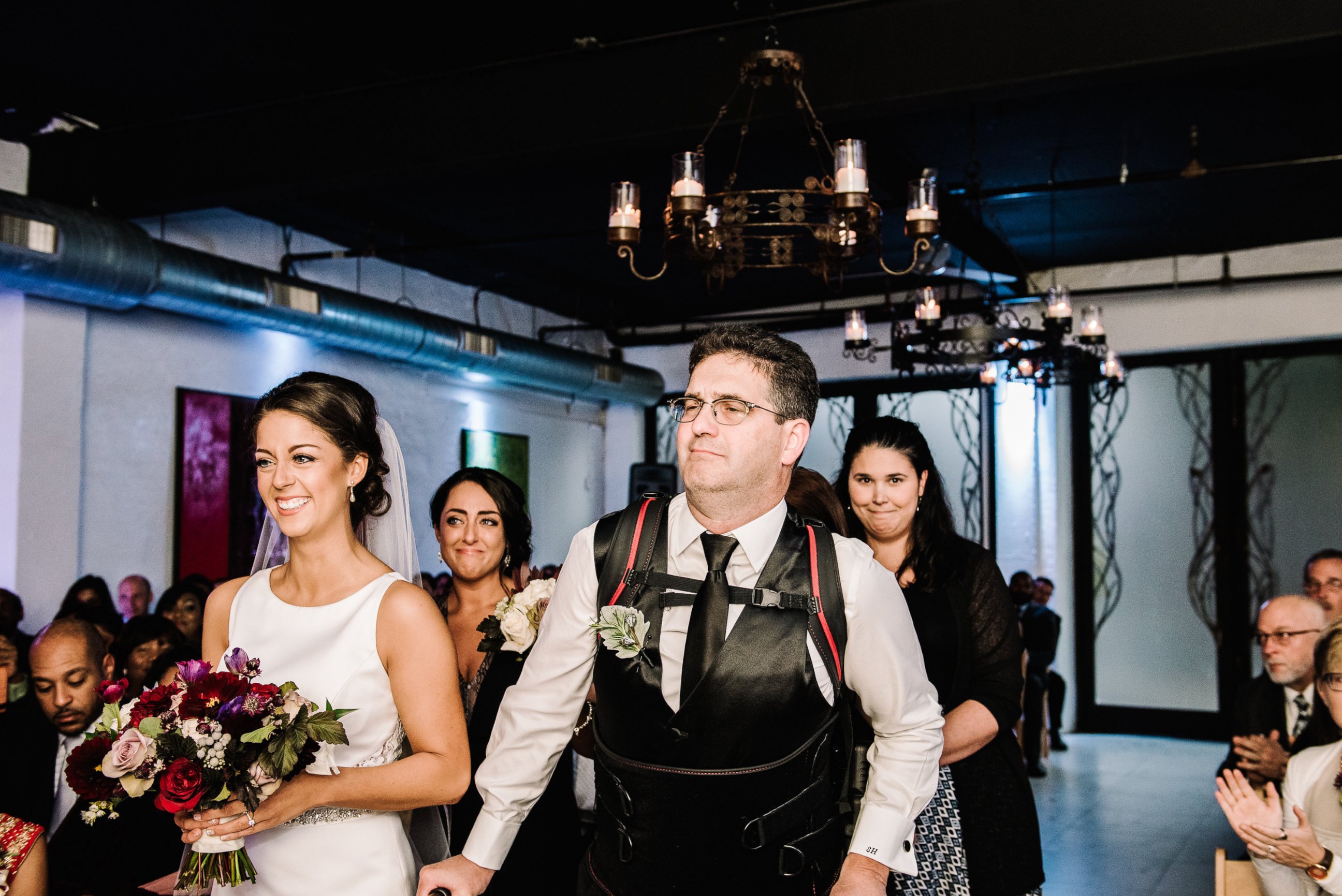 PHOTO: Scott Holland didn't let his multiple sclerosis stop him from walking his daughter, Elise Holland, down the aisle. He surprised her on her wedding day by using an exoskeleton to help him walk. 