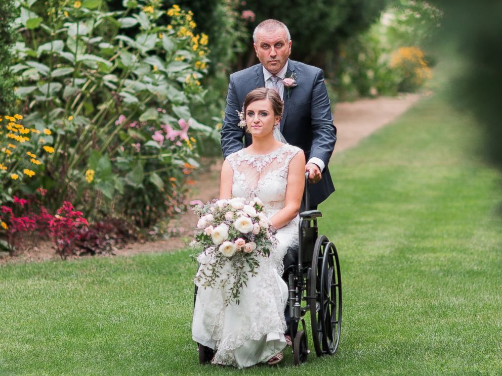 PHOTO: Hannah Patterson was in a car accident five weeks before her wedding, so her husband-to-be, Stuart, carried her down the aisle.
