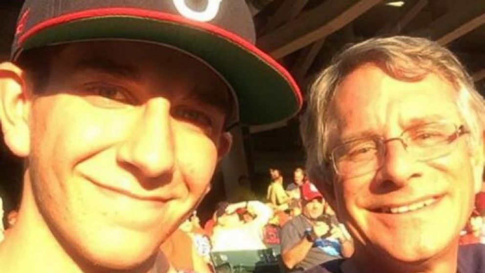 The former students of Struthers High School in Struthers, Ohio, rallied to have their teacher, Richard Gage, attend the World Series with his son Daniel, pictured here.