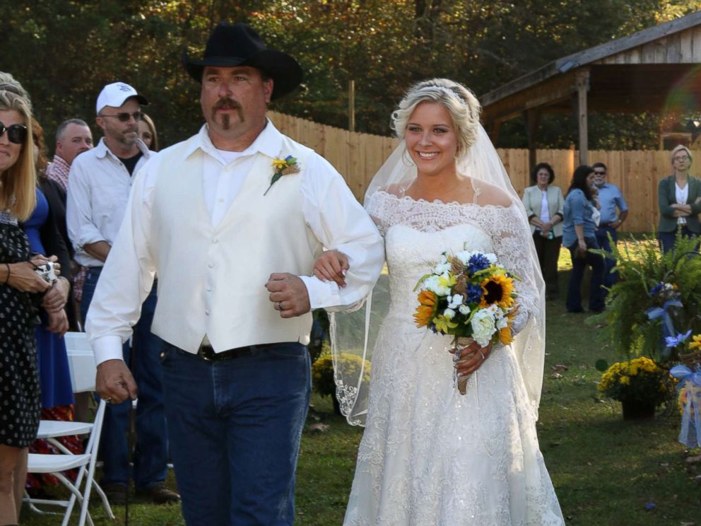 PHOTO: Mikayla Wroten walks down the aisle with her stepdad, Paul Williams.