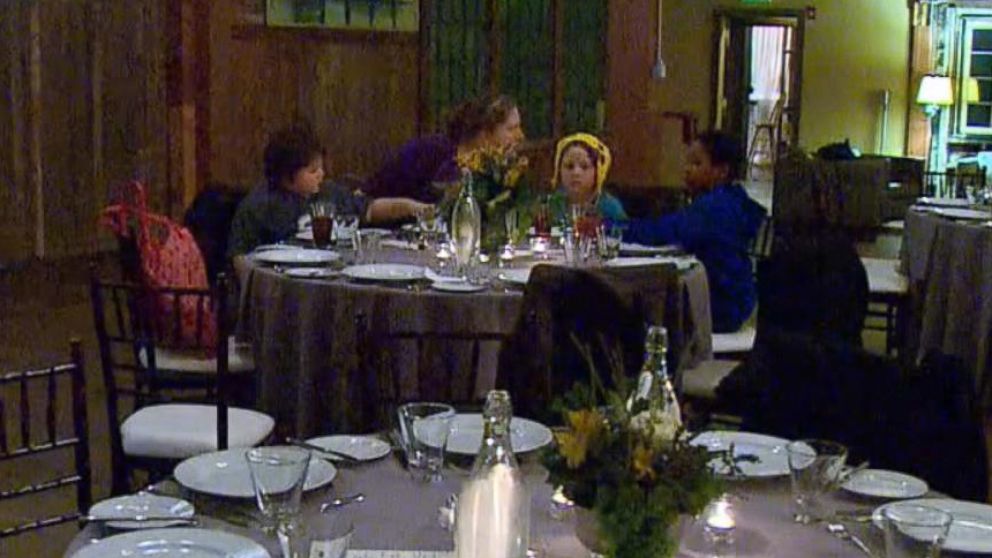 After Dana Olsen canceled her wedding, she changed her reception into a party for homeless kids and their families  in downtown Seattle on Jan. 16, 2016. 