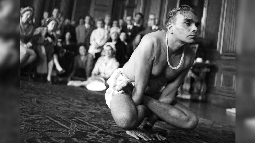 PHOTO: B.K.S. Iyengar gives a yoga demonstration to tennis players at a pre-Wimbledon party in a London suburb in June, 1960.