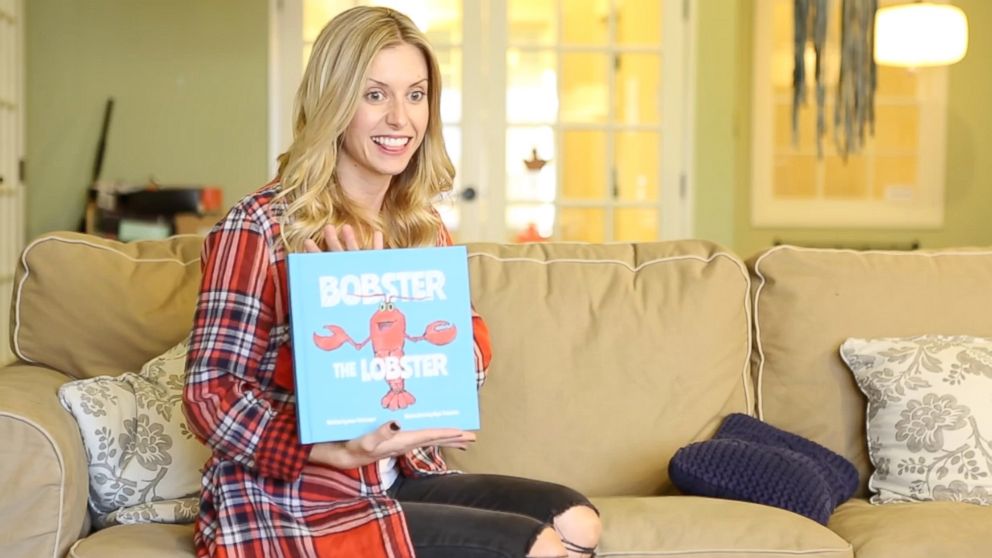 PHOTO: An amusing video has emerged of a creative boyfriend's wedding proposal involving a fake children's book and a lobster costume.