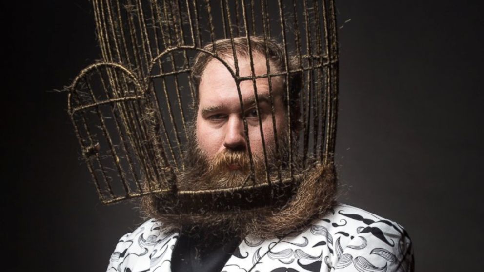 PHOTO: Man Turns Lavish Beard into Enormous Bird Cage
