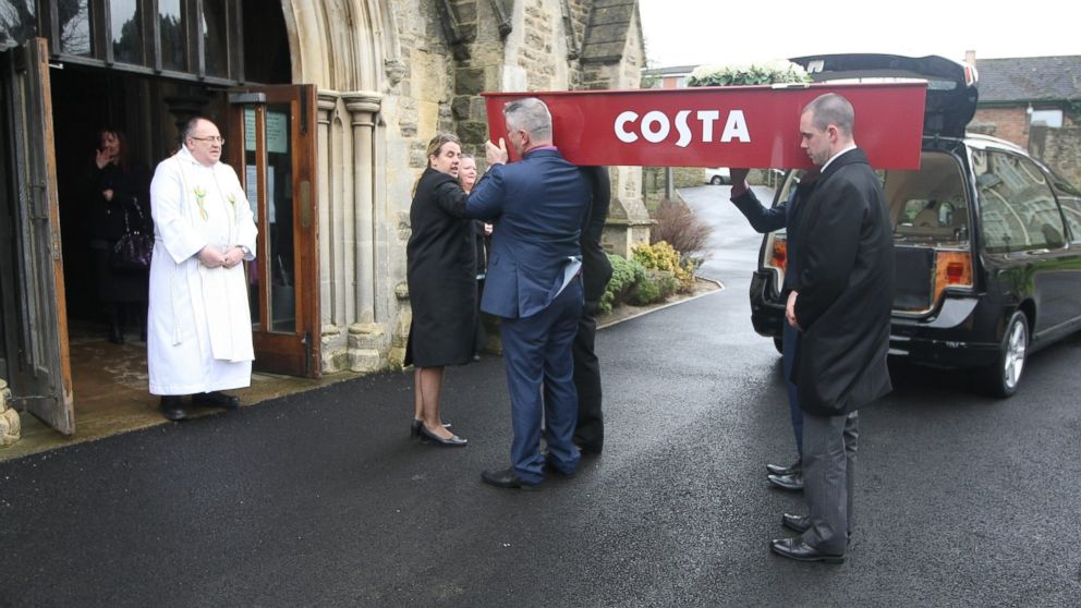 In this undated file photo, the funeral of Karen Lloyd is pictured in Old Town, Wiltshire, England. Lloyd was buried in a Costa coffee coffin, because of her love for lattes. 