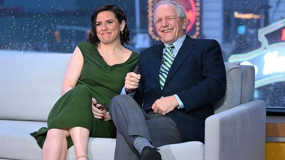 This image released by ABC shows retired ABC News journalist Charlie Gibson, right, with his daughter Kate Gibson on the set of "Good Morning America" in New York on Monday, May 2, 2022, to announce their literary podcast called "The Book Case." (Pau