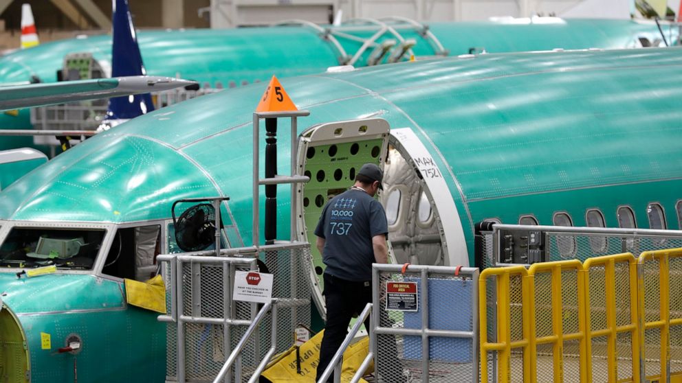 FILE - This March 27, 2019, file photo shows a Boeing 737 MAX 8 airplane on the assembly line during a brief media tour of Boeing's 737 assembly facility in Renton, Wash. Recent crashes have caused an uptick in airline fatalities in 2018 and 2019 aft