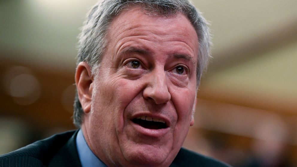 FILE - In this Feb. 11, 2019 file photo, New York City Mayor Bill de Blasio testifies during a joint legislative budget hearing on local government in Albany, N.Y. De Blasio has announced a ban of alcohol advertising on city property. The ban, which 