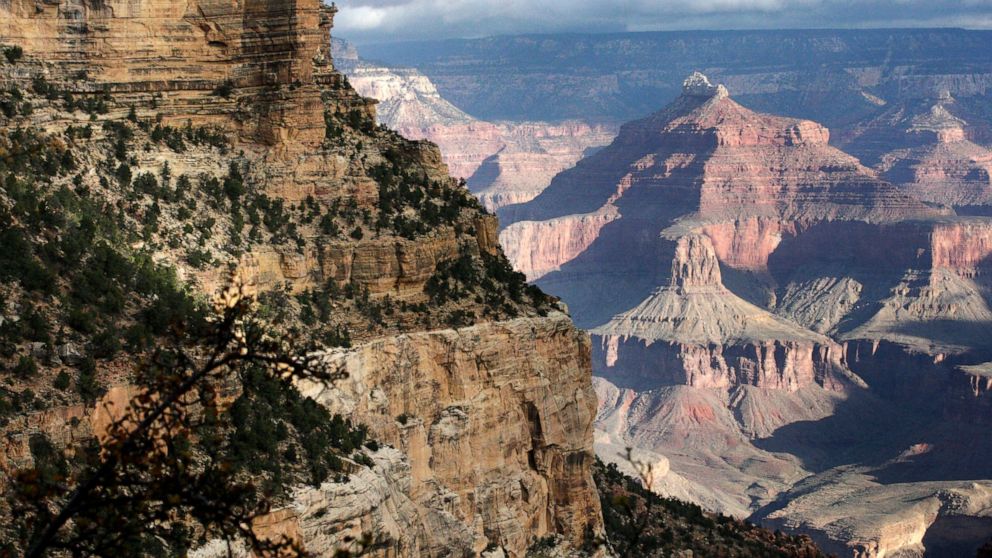 FILE - This Oct. 22, 2012, file photo shows a view from the South Rim of the Grand Canyon National Park in Ariz. Authorities say another visitor has died after falling from the edge of the Grand Canyon. Park rangers found the body of a 70-year-old wo