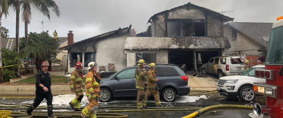 Image result for Plane crashes in California, houses burn