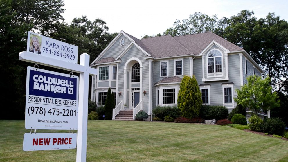 FILE - This July 10, 2017, file photo shows a house for sale, in North Andover, Mass. Nearly a third of Americans who’ve never previously bought a home say they plan to in the next five years, according to a survey commissioned by NerdWallet and cond