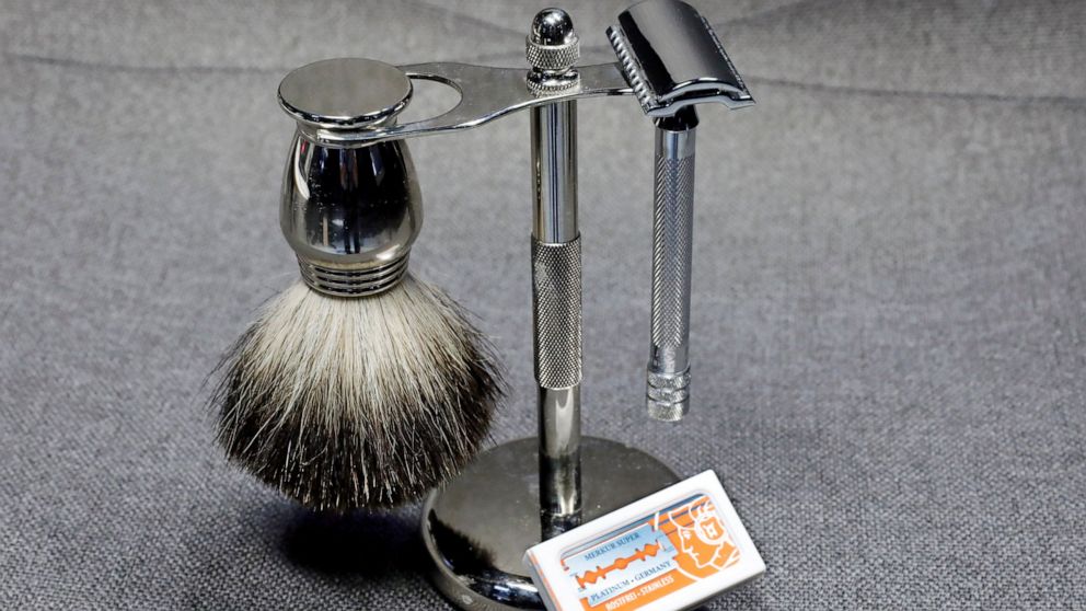 This photo, in New York, Tuesday, Aug. 6, 2019, shows a Col. Ichabod Conk shave set and Merkur double-edge razor blades. Remember the old-school safety razor your grandfather used? It’s making a comeback. Trendy direct-to-consumer brands have reintro
