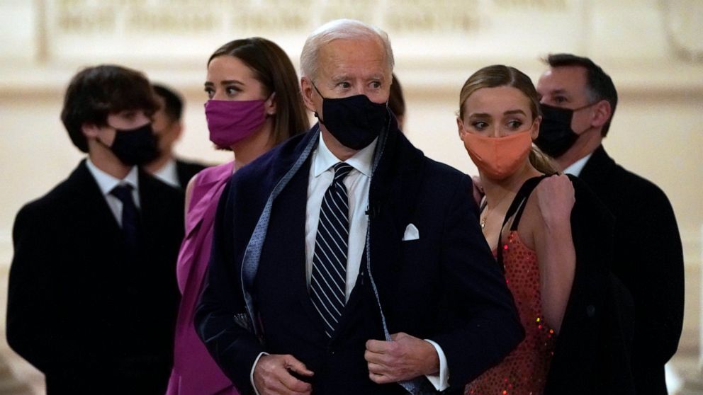 Biden signs a virus outbreak and promises “Help is on the way”