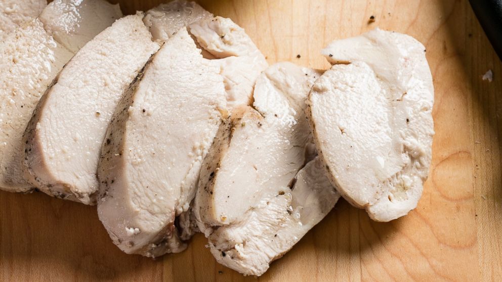 This undated photo provided by America's Test Kitchen in December 2018 shows Foolproof Poached Chicken Breasts in Brookline, Mass. This recipe appears in the cookbook "Sous Vide for Everybody." (Steve Klise/America's Test Kitchen via AP)