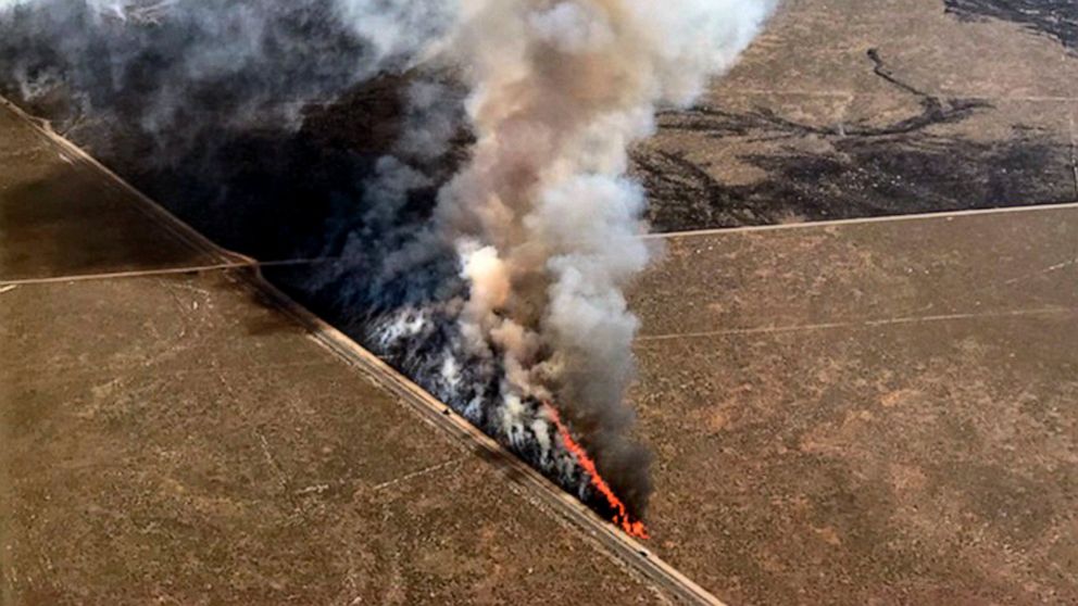This photo provided by the U.S. Bureau of Land Management (BLM) shows wildfires burning in Idaho, Wednesday, July 24, 2019. The largest wildfire at the nation's primary nuclear research facility in recent history had been burning close to buildings c