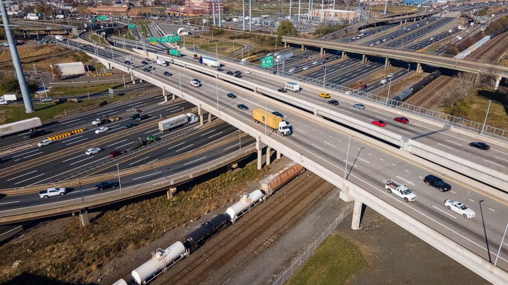 Drivers travel on the New Jersey Turnpike and connecting roads in Elizabeth, New Jersey, on Wednesday, Nov. 23, 2022. AAA predicts that nearly 55 million people in the U.S. will travel at least 50 miles from home this week, an increase over last year