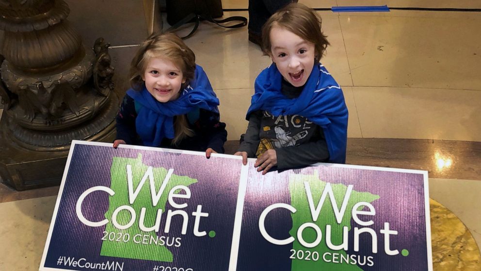 FILE - In this April 1, 2019, photo, Noelle Fries, 6, left, and Galen Biel, 6, both of Minneapolis, attend a rally at the Minnesota Capitol to kick off a year-long drive to try to ensure that all Minnesota residents are counted in the 2020 census. Ar