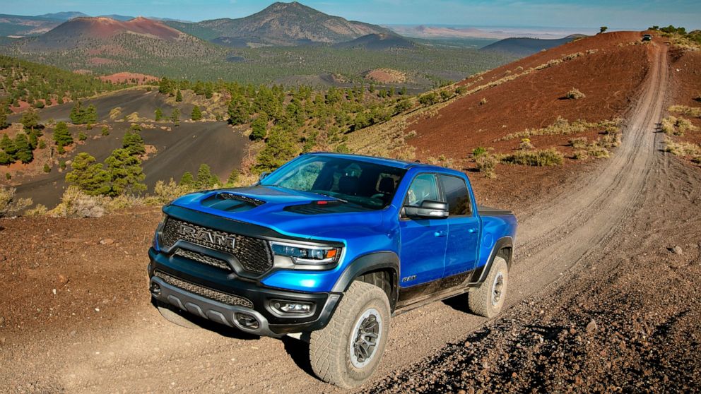 This photo provided by FCA shows the 2021 Ram 1500 TRX, a full-size pickup truck that features a remarkably powerful V8 engine that's borrowed from the Dodge Challenger Hellcat. We’re in a golden age of off-road pickup trucks that you can buy straigh