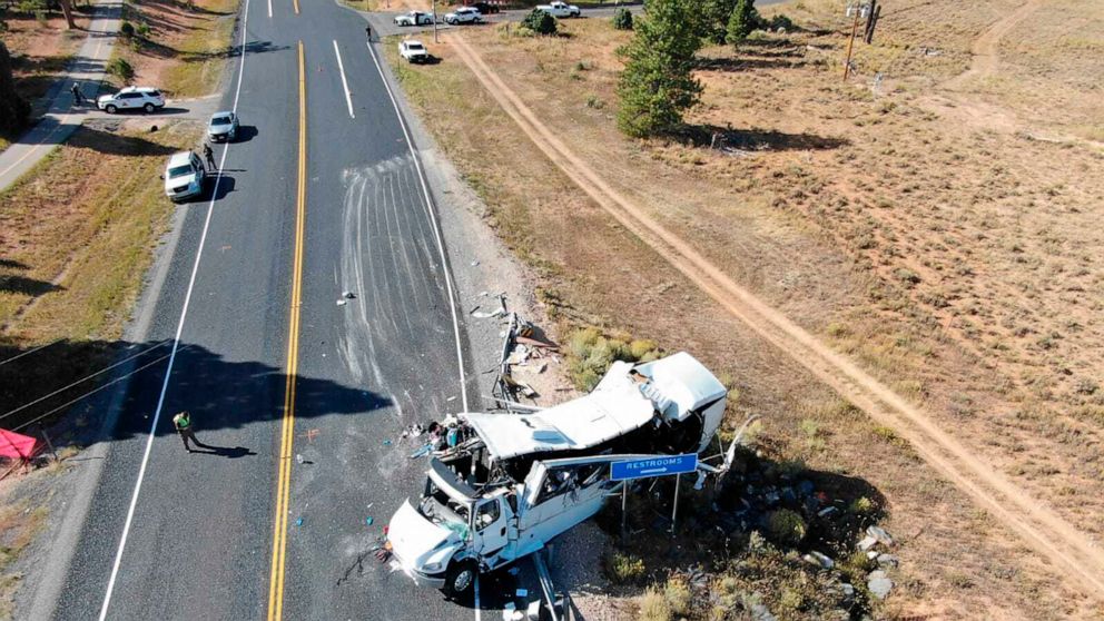 This photo provided by the Utah Highway Patrol shows a tour bus carrying Chinese-speaking tourists after it crashed near Bryce Canyon National Park in southern Utah, killing at least four people and critically injuring multiple others, Friday, Sept. 