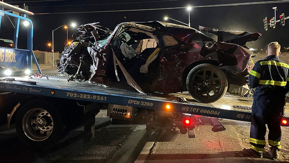 This photo released by the North Las Vegas Police Department shows a Dodge Challenger in North Las Vegas on Saturday, Jan. 29, 2022. Las Vegas police said the driver and his passenger were among the dead after Saturday's crash and the ages of the oth