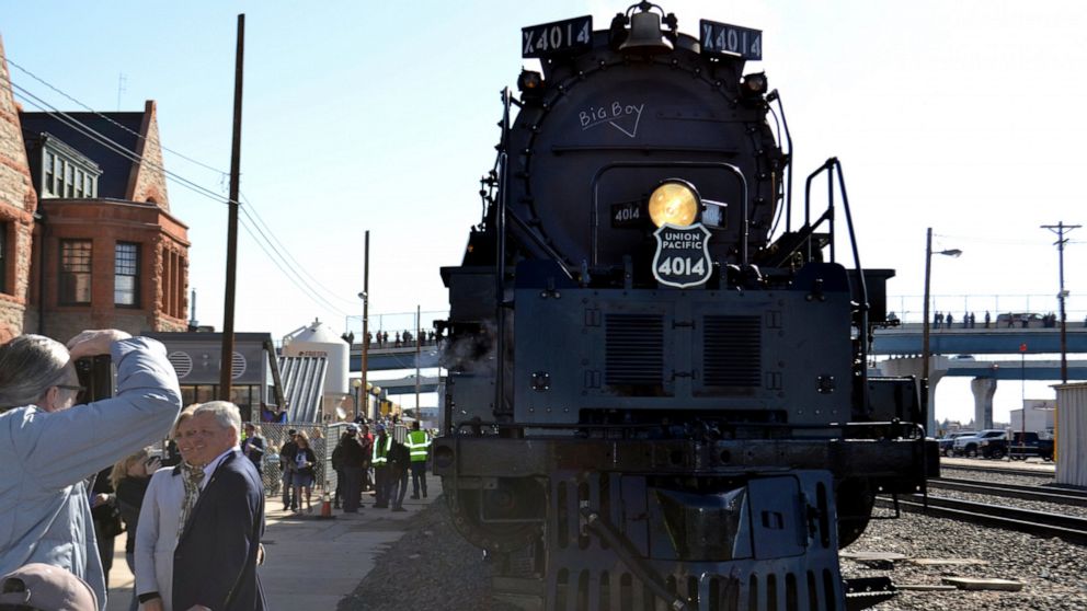 The Big Boy No. 4014 rolls out of a Union Pacific restoration shop at the Cheyenne Depot Museum in Cheyenne, Wyo., Saturday, May 4, 2019. One of the world's biggest and most powerful steam locomotives is chugging to its big debut after five years of 