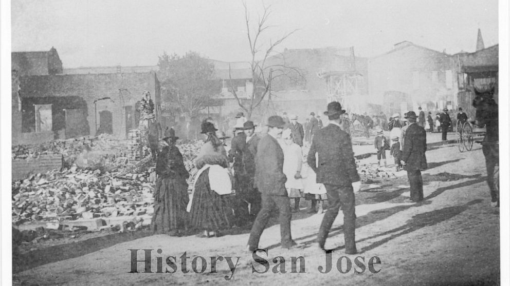 This 1887 photo provided by History San Jose, part of the History San Jose Photographic Collection, shows Market Street in Chinatown just after an arson fire in San Jose, Calif. More than a century after arsonists burned it to the ground in 1887, the