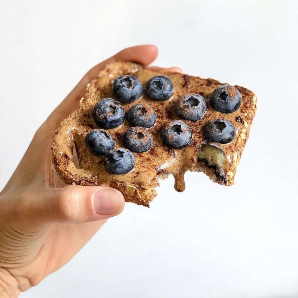 PHOTO: AlmondButterToast -This drippy almond butter and blueberry toast with Pumpkin Pie spice from Anna Brown of @nutritionsqueezed.