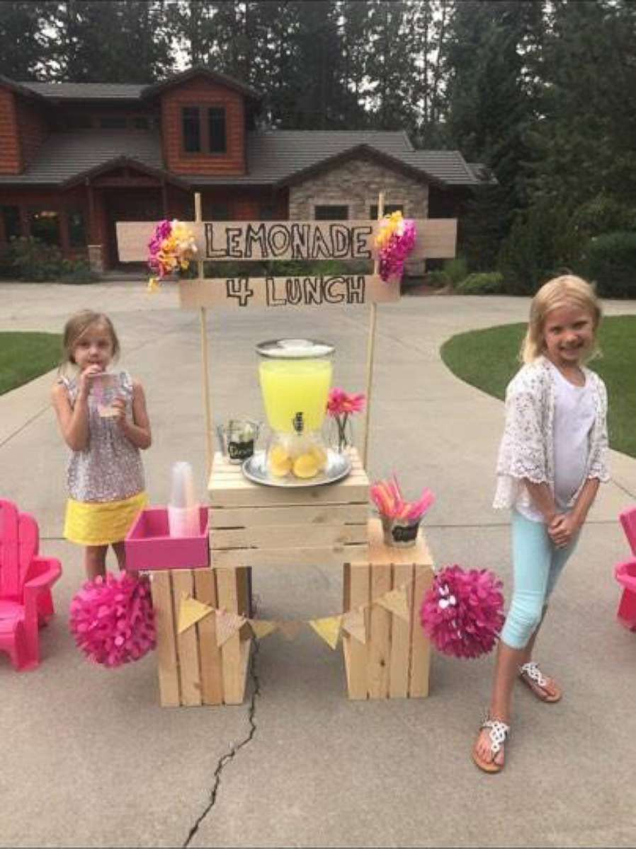 PHOTO: Hayden Meadows Elementary School student Amiah Van Hill, 6, and her little sister Aria, 4, used lemonade stands to raise money to pay off fellow students' lunch debts. 