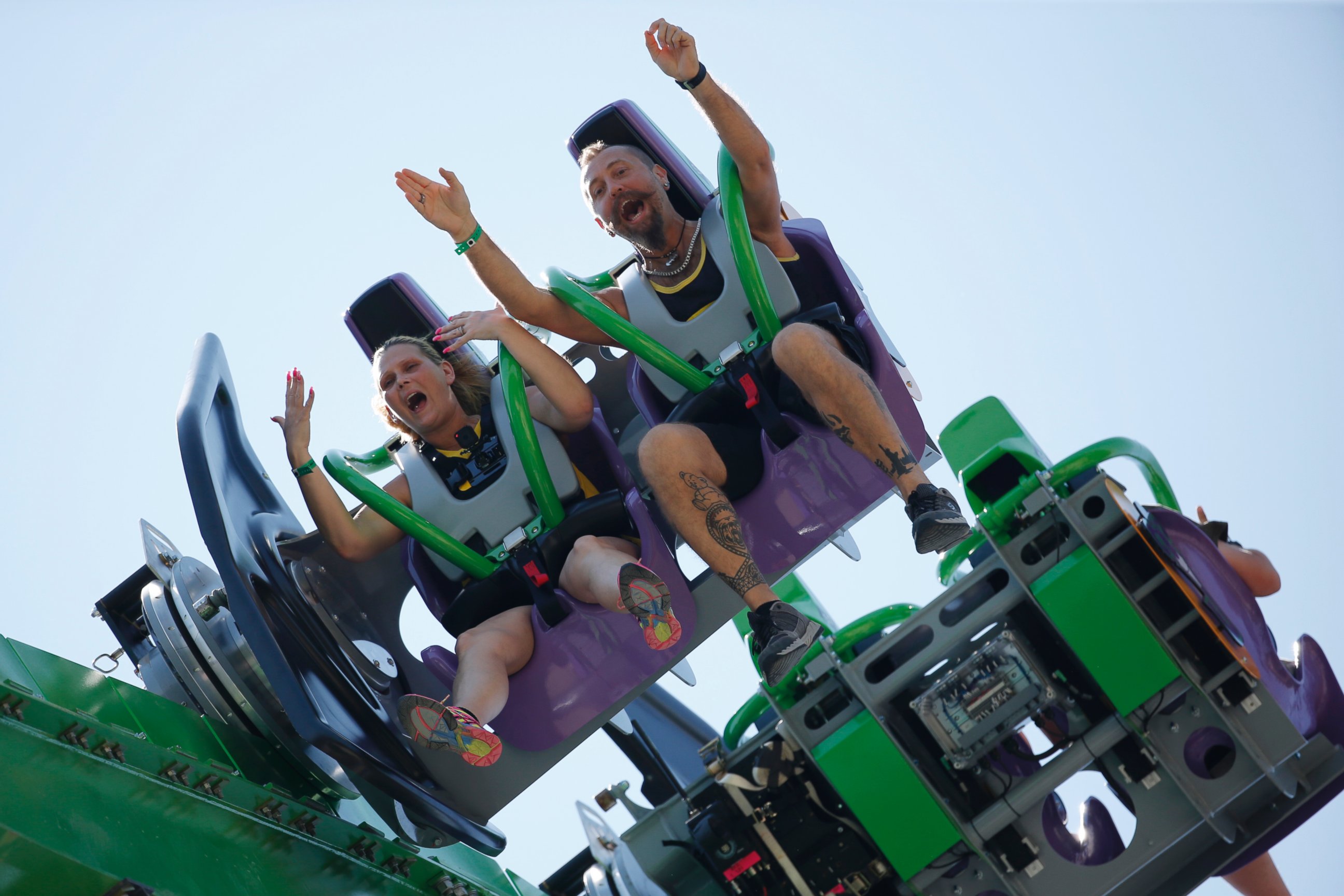 PHOTO: People ride "The Joker," at Six Flags Great Adventure, during the ride's unveiling on May 26, 2016, in Jackson, N.J.