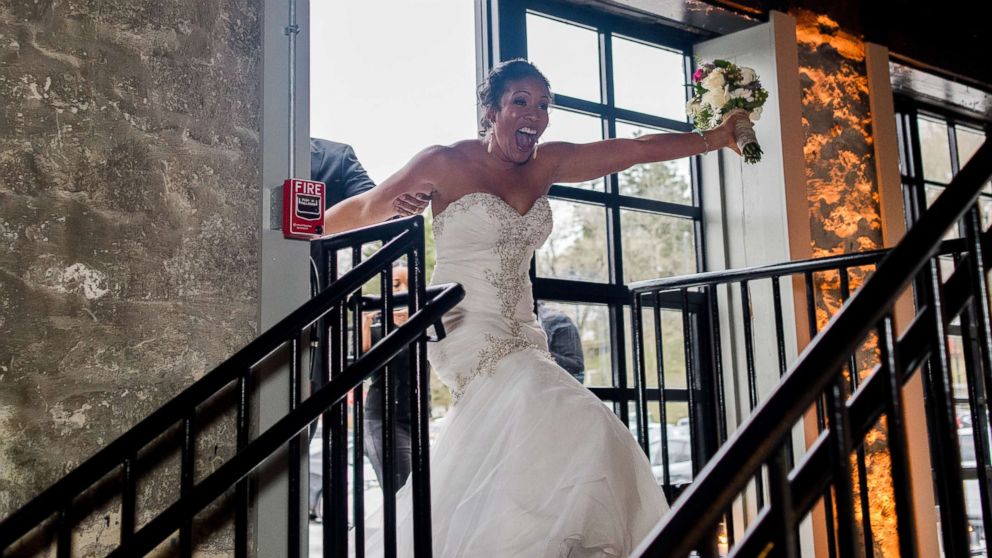 PHOTO: Bride Jarnell Swecker surprises guests in her wedding gown on April Fools' Day 2017. 