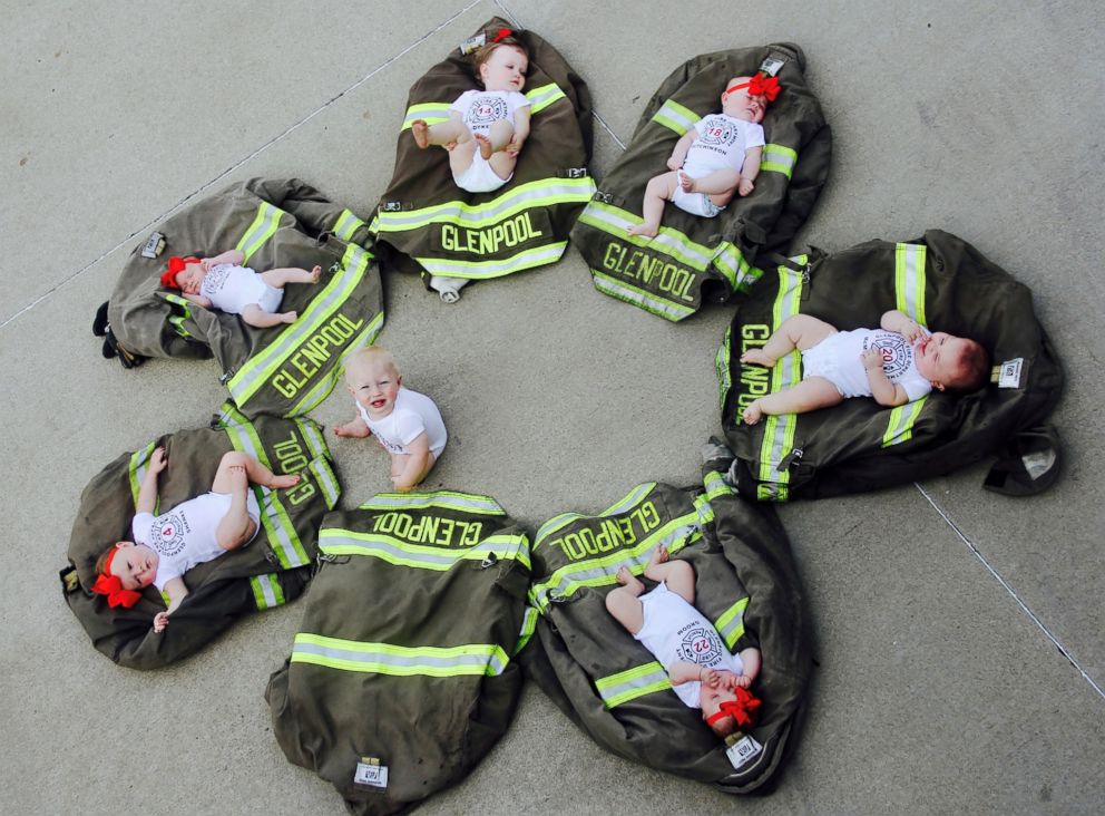 PHOTO: The ladder-men of Glenpool Fire Department in Glenpool, Oklahoma, posed with their kids on Sunday in a adorable photos snapped by Avery Dykes, who is mom to the oldest baby in the bunch.