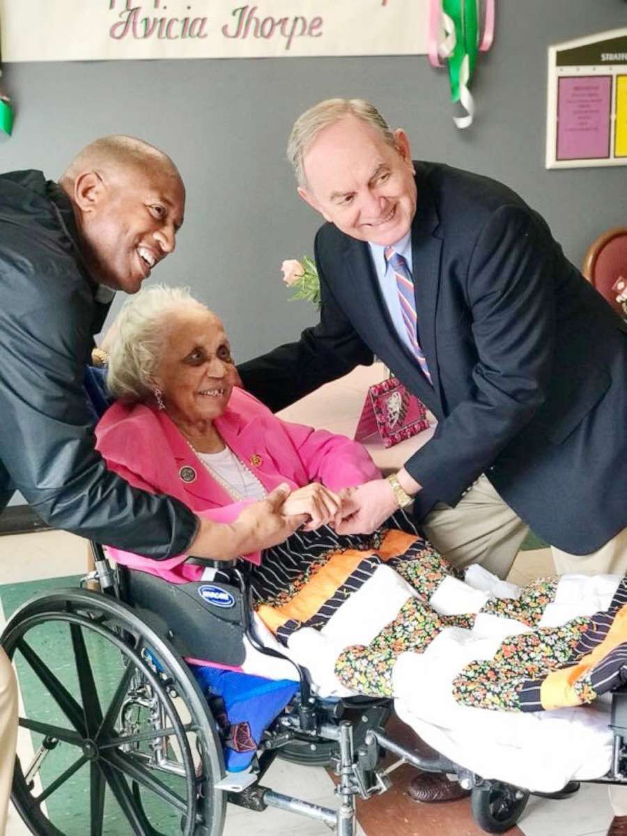 PHOTO: Danville Mayor John Gilstrap and Vice Mayor Alonzo Jones flank Avicia Thorpe at her birthday party inside the Stratford Rehabilitation Center in Danville, Va., April 16, 2018.