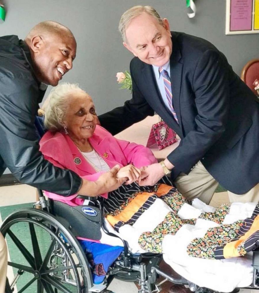 PHOTO: Danville Mayor John Gilstrap and Vice Mayor Alonzo Jones flank Avicia Thorpe at her birthday party inside the Stratford Rehabilitation Center in Danville, Va., April 16, 2018.