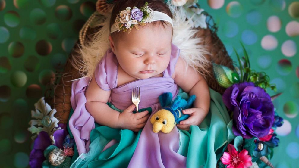 PHOTO: A photographer turned newborn babies into Disney princesses for a magical photo shoot. 