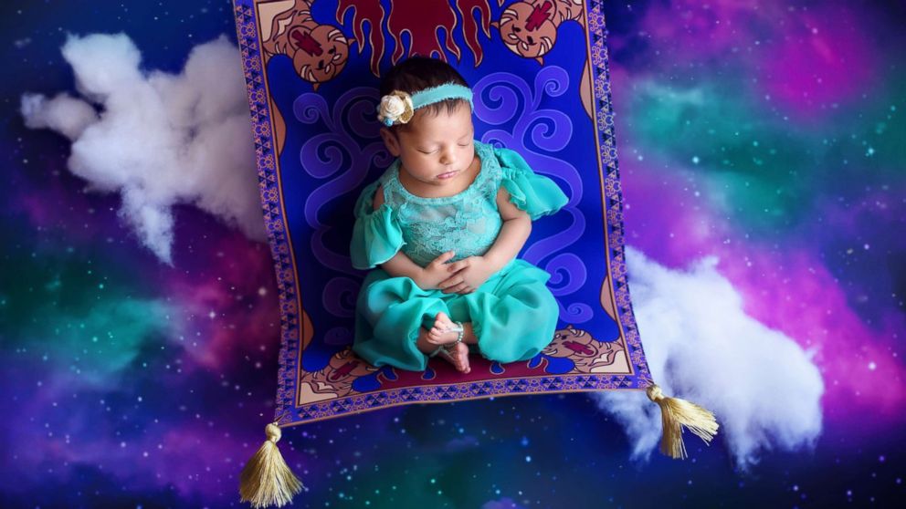 PHOTO: A photographer turned newborn babies into Disney princesses for a magical photo shoot. 

