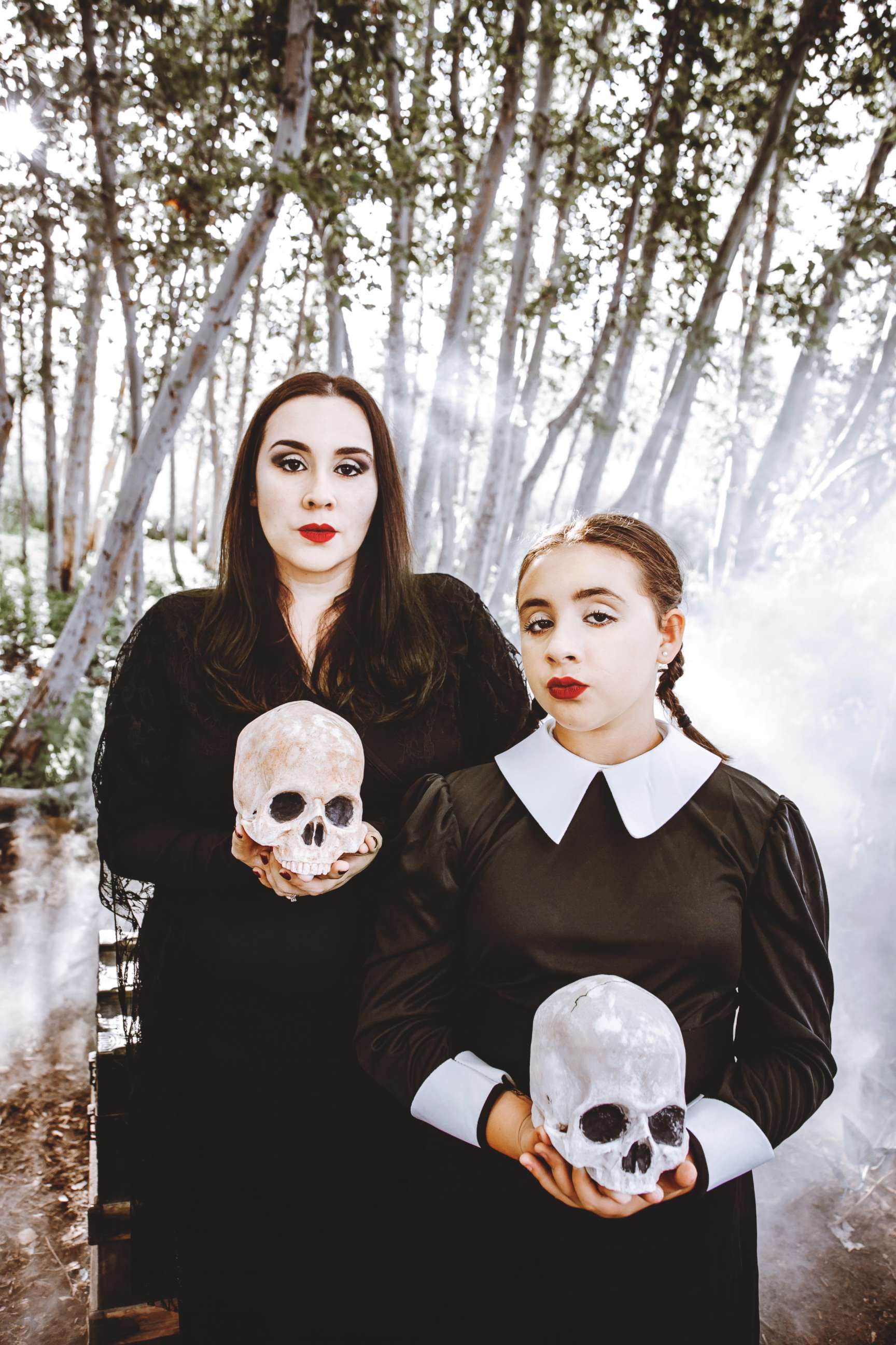 PHOTO: Michelle Basteen and her daughter, Madison, pose as Morticia and Wednesday Addams.