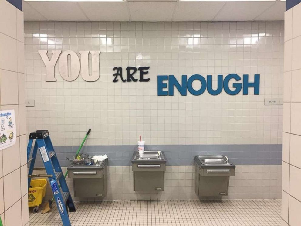 PHOTO: Mary Moore Elementary School students are greeted by inspirational messages in their school bathrooms.