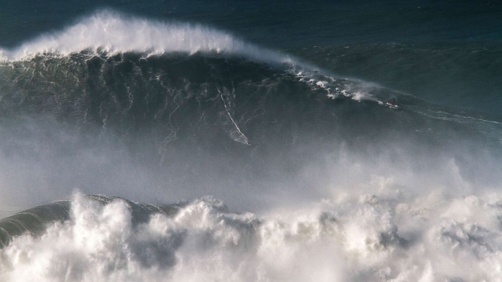 Brazilian Surfer Sets New Record After Riding Massive 80 Foot Wave 