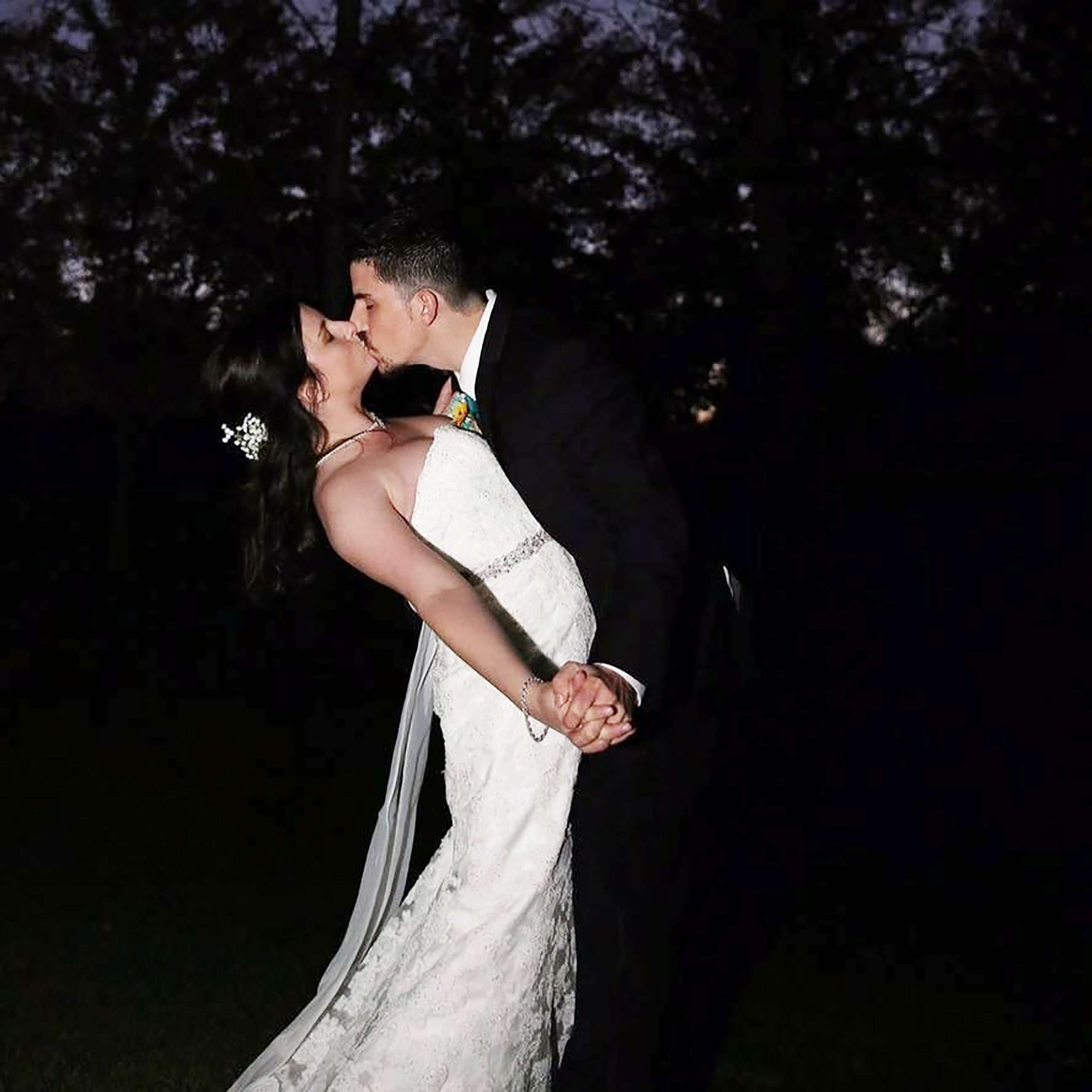 PHOTO: Jennifer Jensen, 24, and Bill Jensen, 27, share a kiss on their wedding day.