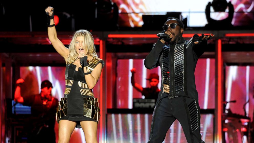 PHOTO: Fergie and will.i.am of the Black Eyed Peas perform on the final night of their tour at Sun Life Stadium, Nov. 23, 2011, in Miami Gardens, Florida.