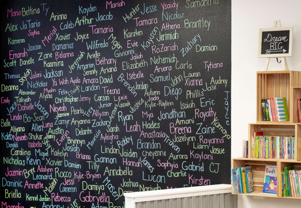 PHOTO: Shoppers at The Twig write their names on a board in the store.